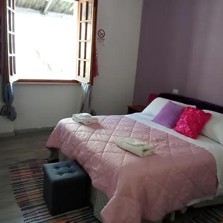 Economy Smeralda Room's Проживання в сім'ї